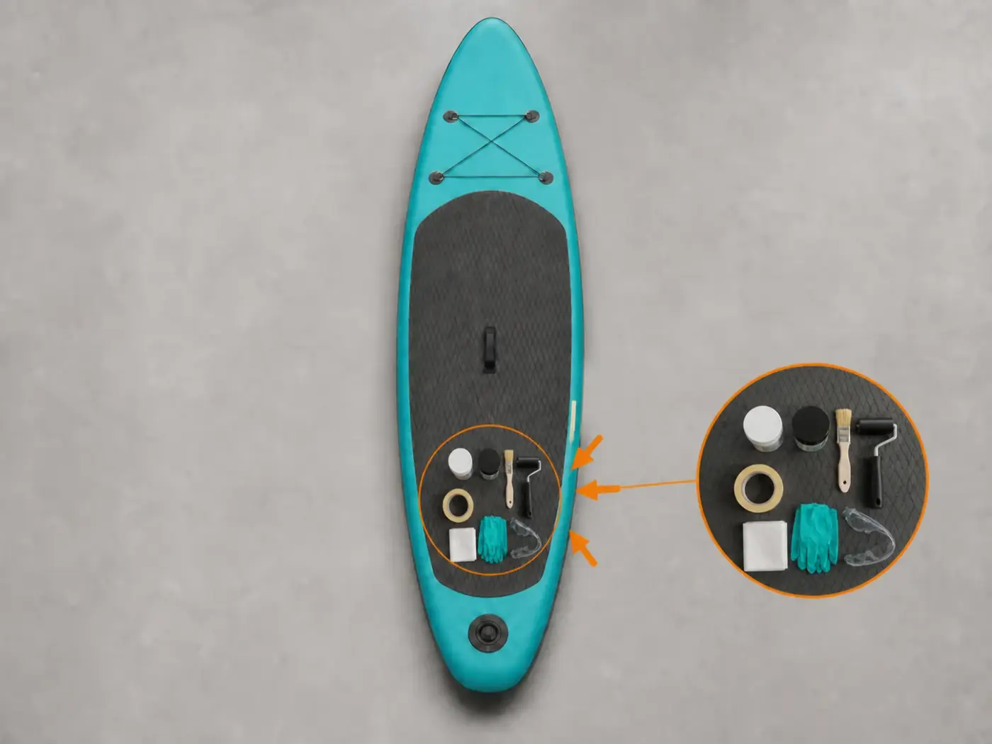 SUP dégonflé sur un établi aéré avec gants, lunettes, outils ordonnés et rail protégé